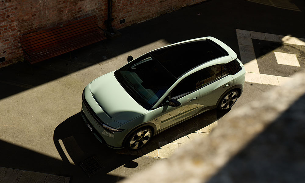 High angle image of a green electric SUV
