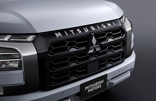 Triton front grille with chrome lettering